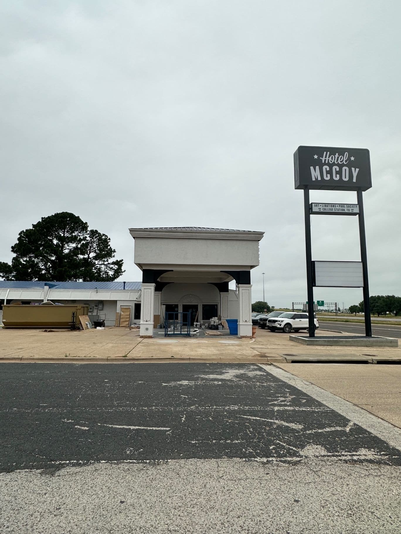 Hotel McCoy entrance with materials near the doorway