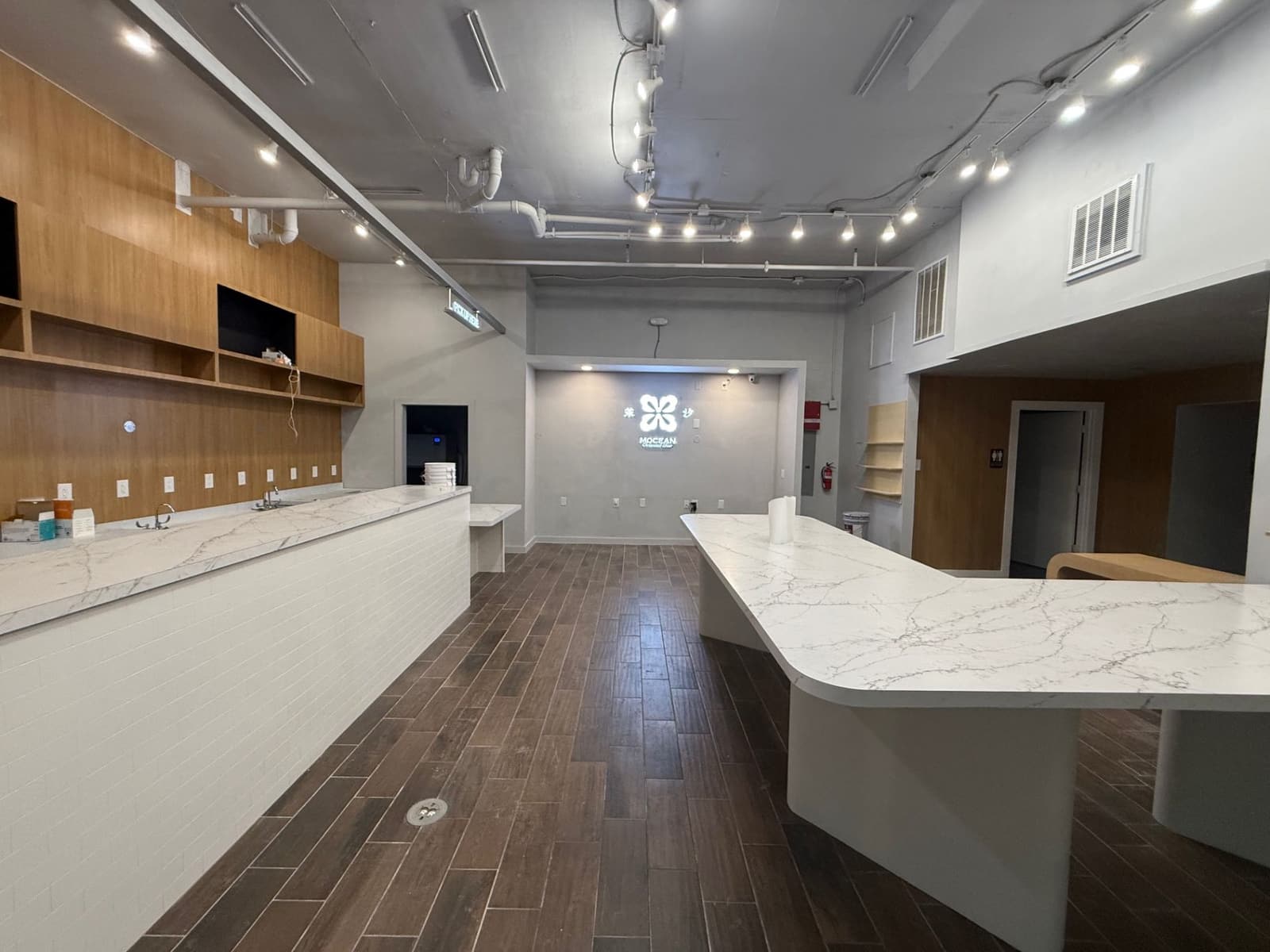 Mocean Tea commercial interior with service counters and millwork